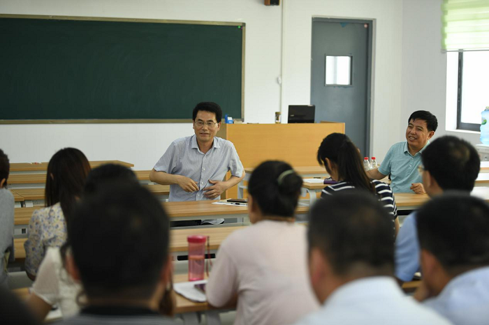 9.周校长总结发言.png
